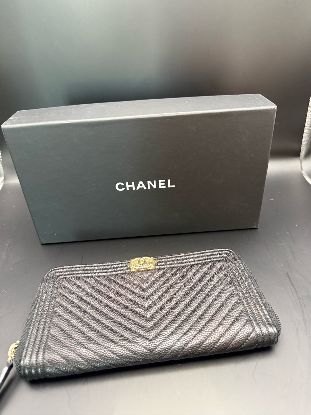 CHANEL Black Chevron Caviar Zippy Organizer Wallet with Gold CC Emblem